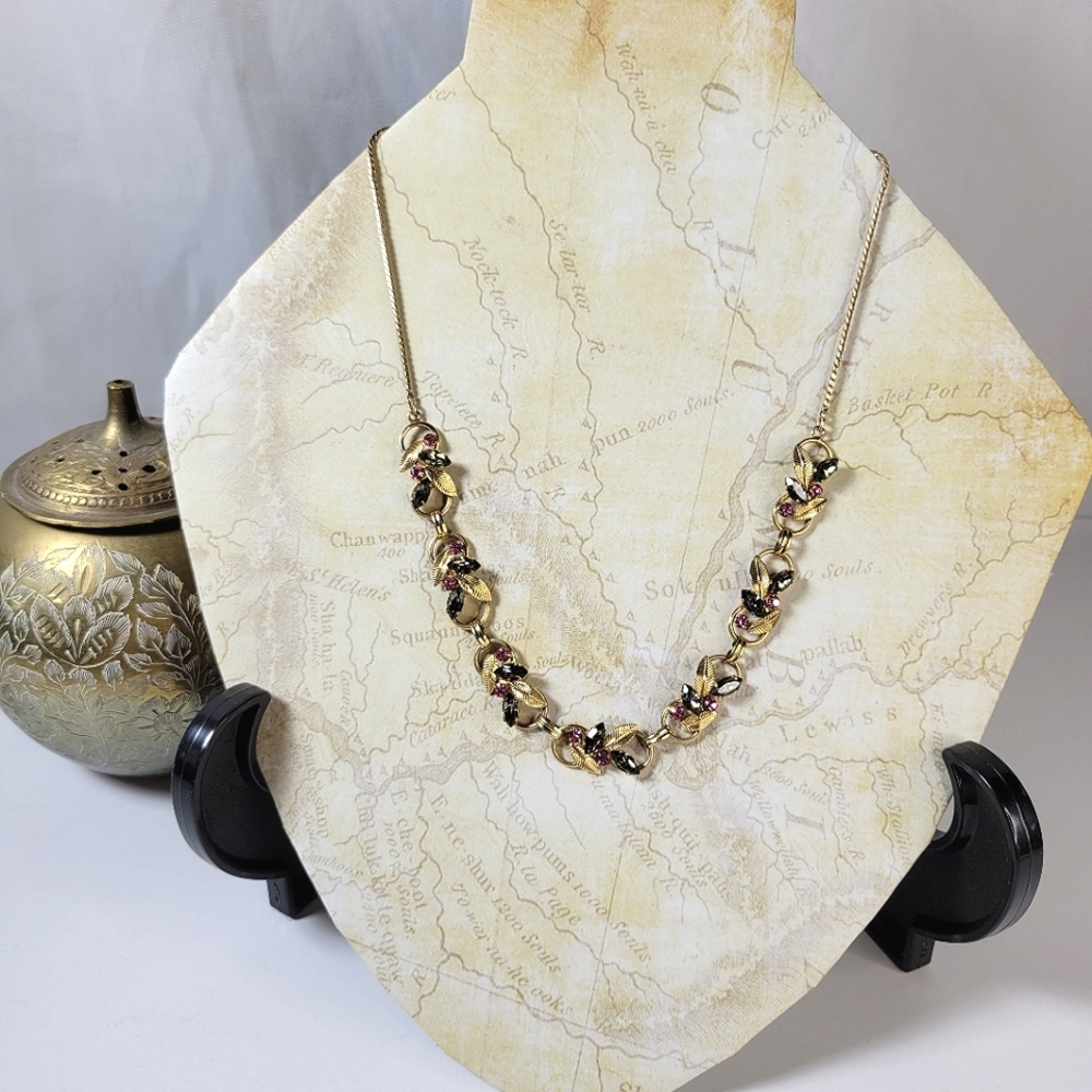 Gold filled rope chain with gold and gem leaf details 16"